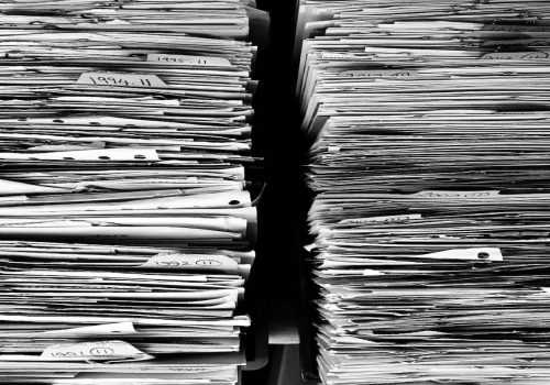 two stacks of paper side by side